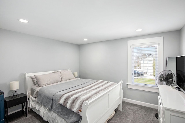 9861 Dixie, Ira, MI 48023 - bedroom featuring dark carpet, baseboards, and recessed lighting