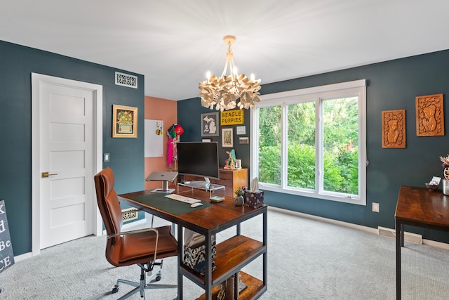 carpeted home office with baseboards, plenty of natural light, visible vents, and a notable chandelier