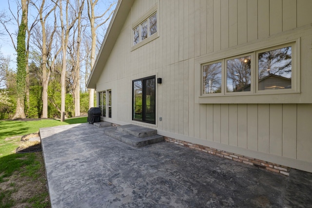 back of property with a patio