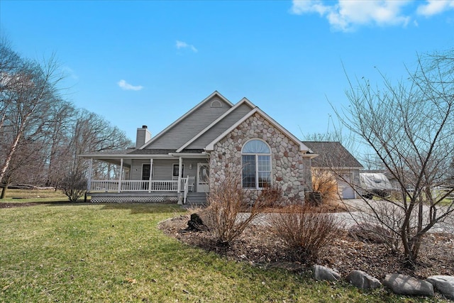 80442 Woodridge Ln, Romeo, MI 48065 - view of front of property featuring a porch, stone siding, a chimney, and a front lawn