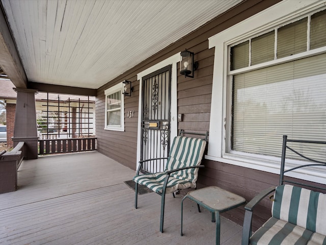 wooden deck with covered porch