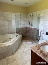 5238 Windmill Dr, Troy, MI 48085 - bathroom featuring tile patterned floors, walk in shower, a whirlpool tub, and vanity