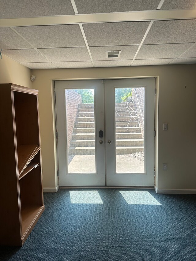 5238 Windmill Dr, Troy, MI 48085 - doorway to outside featuring a paneled ceiling, french doors, baseboards, and carpet floors