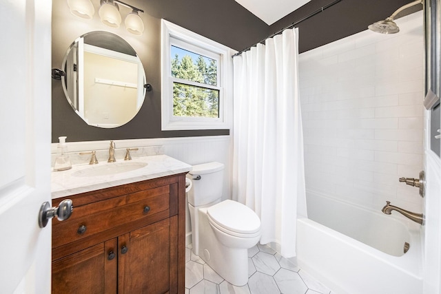 full bathroom with toilet, shower / bathtub combination with curtain, vanity, wainscoting, and tile patterned floors