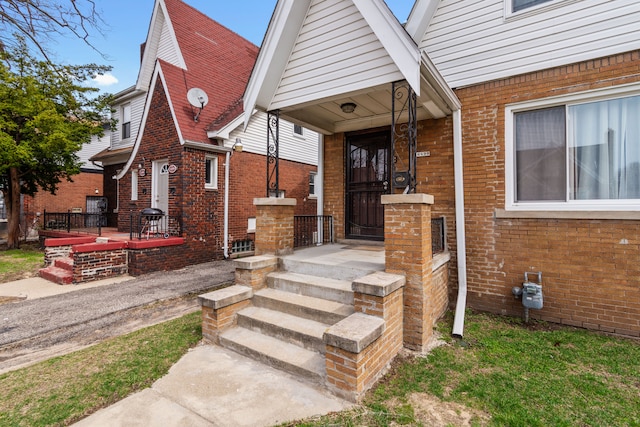 16890 Monica St, Detroit, MI 48221 - view of front of home featuring brick siding and covered porch