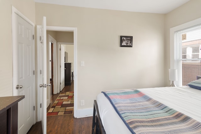 16890 Monica St, Detroit, MI 48221 - bedroom featuring dark wood-style flooring and baseboards