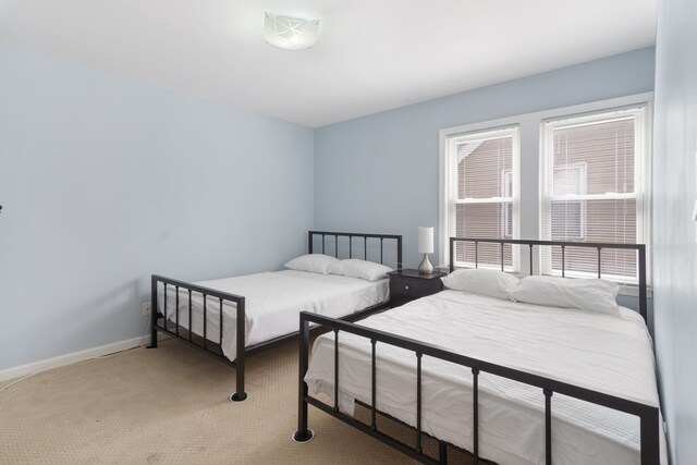 16890 Monica St, Detroit, MI 48221 - bedroom featuring light carpet and baseboards