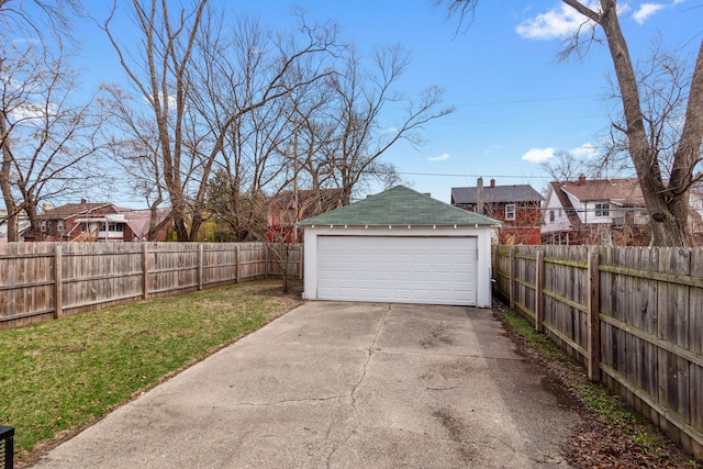 16890 Monica St, Detroit, MI 48221 - detached garage featuring fence and a residential view