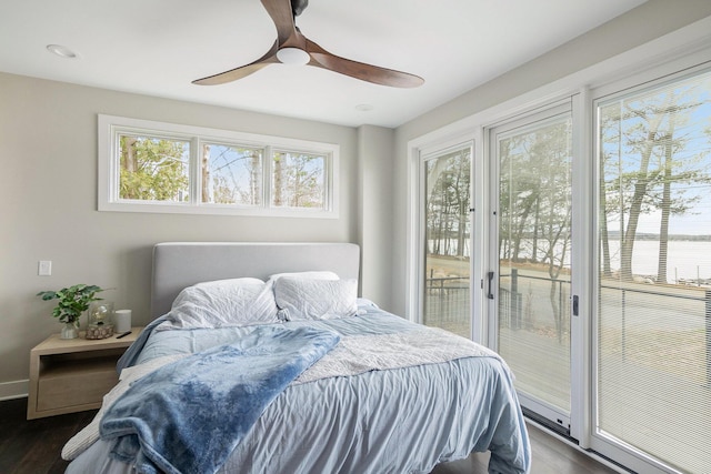 bedroom with ceiling fan, access to outside, baseboards, and dark wood-style floors