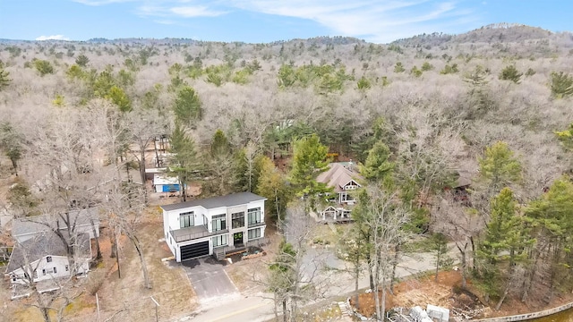 drone / aerial view with a forest view