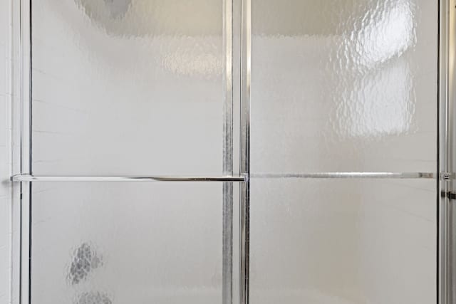 1053 Woodward Hts, Ferndale, MI 48220 - full bathroom featuring an enclosed shower