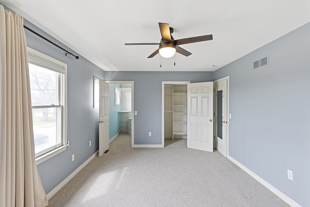 1053 Woodward Hts, Ferndale, MI 48220 - unfurnished bedroom featuring light carpet, a closet, baseboards, and visible vents