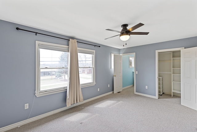 1053 Woodward Hts, Ferndale, MI 48220 - unfurnished bedroom with a closet, baseboards, a ceiling fan, and carpet