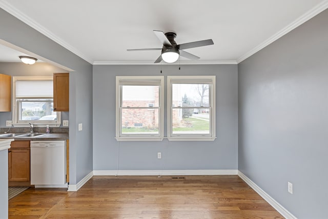 1053 Woodward Hts, Ferndale, MI 48220 - kitchen with a sink, light wood-style flooring, a ceiling fan, and white dishwasher