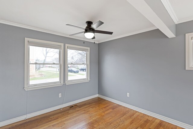 1053 Woodward Hts, Ferndale, MI 48220 - unfurnished room featuring light wood-type flooring, ceiling fan, baseboards, and visible vents