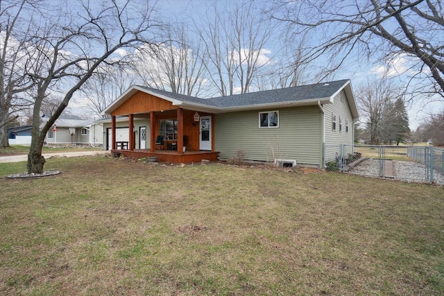 739 Gasper St, Chesaning, MI 48616 - view of front facade featuring a front yard, covered porch, a garage, fence, and a gate