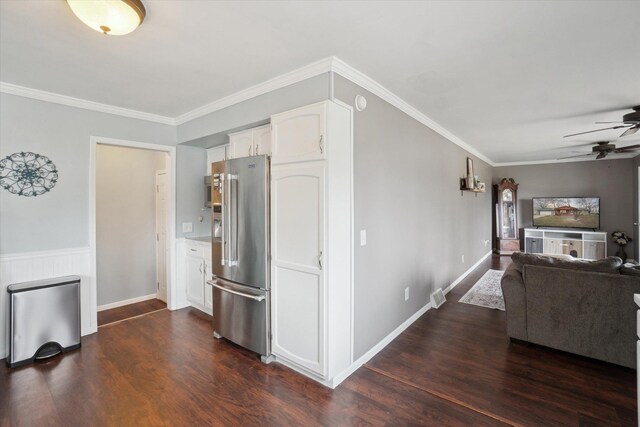 739 Gasper St, Chesaning, MI 48616 - kitchen with dark wood-type flooring, ornamental molding, a ceiling fan, white cabinets, and high end refrigerator
