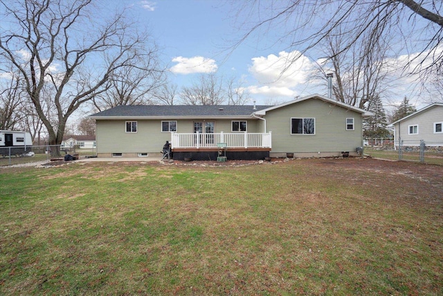739 Gasper St, Chesaning, MI 48616 - back of house with a yard, a wooden deck, a fenced backyard, and a patio area