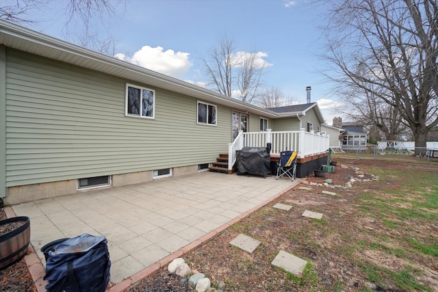 739 Gasper St, Chesaning, MI 48616 - back of property with a patio area and a wooden deck