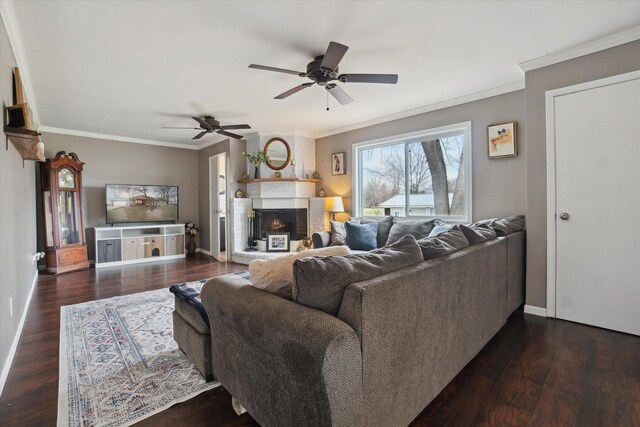 739 Gasper St, Chesaning, MI 48616 - living room with crown molding, wood finished floors, baseboards, and a ceiling fan