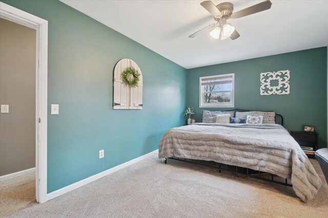 739 Gasper St, Chesaning, MI 48616 - carpeted bedroom with baseboards and a ceiling fan