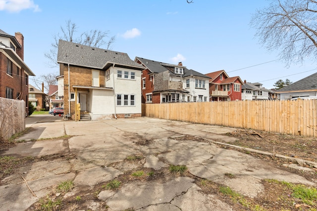 1651 Edison St, Detroit, MI 48206 - rear view of house with a residential view and entry steps