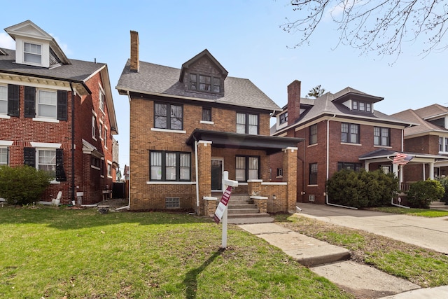 1651 Edison St, Detroit, MI 48206 - american foursquare style home featuring brick siding, a front yard, a chimney, and a porch