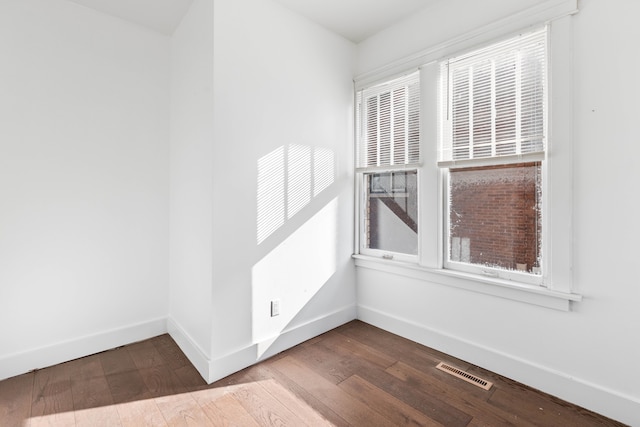 1651 Edison St, Detroit, MI 48206 - unfurnished room featuring baseboards and wood finished floors