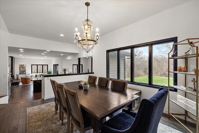1194 Eagle Nest, Milford, MI 48381 - dining room featuring a chandelier, dark wood-type flooring, and recessed lighting
