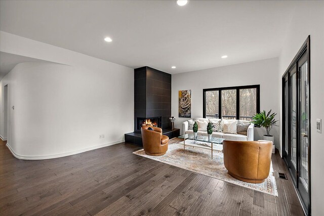 1194 Eagle Nest, Milford, MI 48381 - living room with wood finished floors, recessed lighting, a fireplace, and baseboards