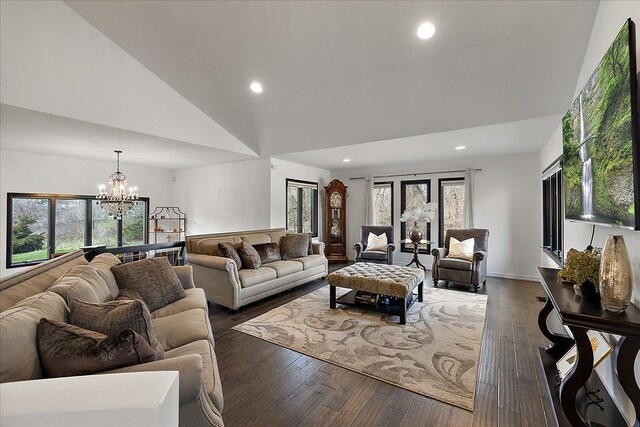 1194 Eagle Nest, Milford, MI 48381 - living room featuring a chandelier, recessed lighting, high vaulted ceiling, and dark wood finished floors