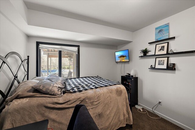 1194 Eagle Nest, Milford, MI 48381 - carpeted bedroom with baseboards and access to exterior