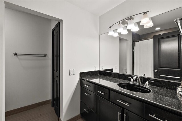 1194 Eagle Nest, Milford, MI 48381 - bathroom featuring baseboards and vanity