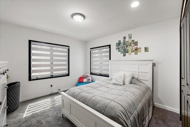 1194 Eagle Nest, Milford, MI 48381 - bedroom featuring dark carpet and baseboards