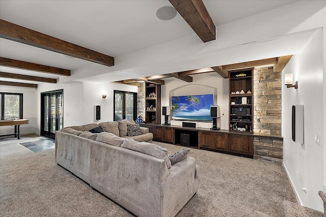 1194 Eagle Nest, Milford, MI 48381 - living area with light carpet, baseboards, beam ceiling, and plenty of natural light