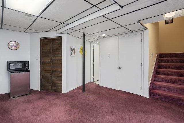 31052 Silverdale Dr, Novi, MI 48377 - finished basement featuring carpet floors, stairway, a paneled ceiling, and refrigerator