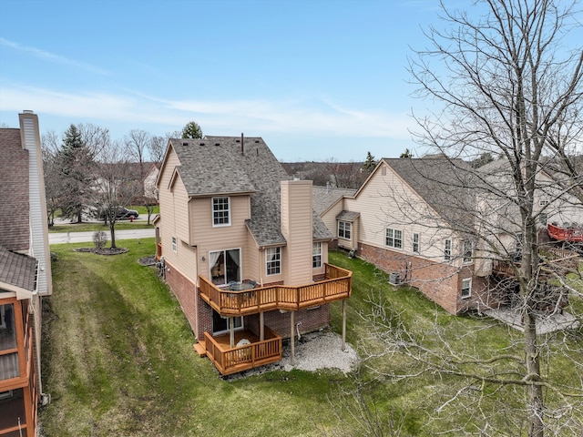 31052 Silverdale Dr, Novi, MI 48377 - back of property with roof with shingles, a chimney, cooling unit, a wooden deck, and a yard