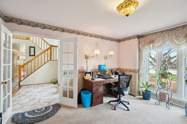 home office featuring french doors, a wainscoted wall, and carpet floors