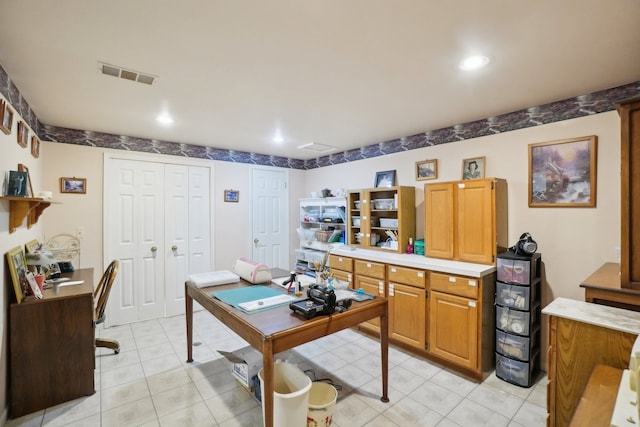 office featuring recessed lighting, light tile patterned floors, and visible vents