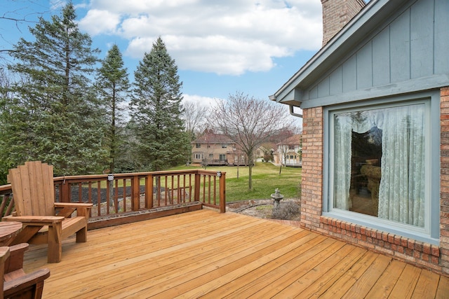 wooden deck with a yard