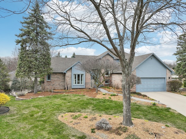 single story home featuring concrete driveway, roof with shingles, an attached garage, a front yard, and brick siding