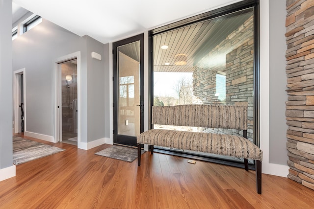 10485 Hadley Rd, Gregory, MI 48137 - interior space with wood finished floors, baseboards, and floor to ceiling windows