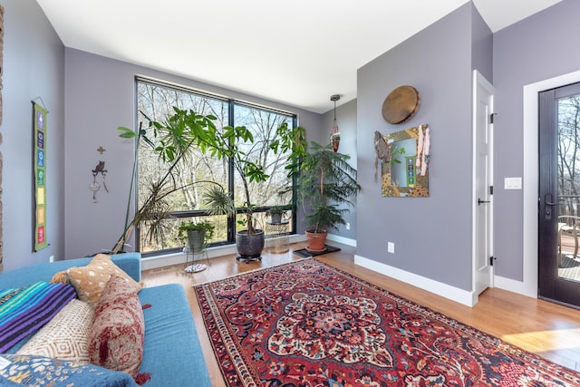 10485 Hadley Rd, Gregory, MI 48137 - living room with wood finished floors and baseboards