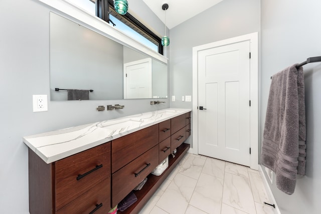 10485 Hadley Rd, Gregory, MI 48137 - bathroom with double vanity, marble finish floor, and a sink