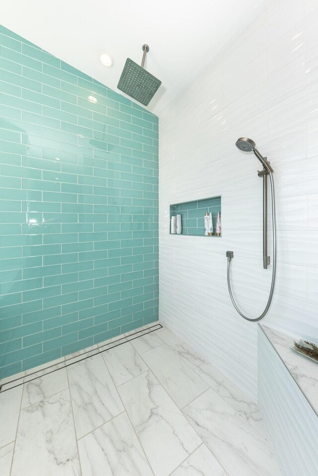 10485 Hadley Rd, Gregory, MI 48137 - bathroom with tile walls, marble finish floor, and a tile shower