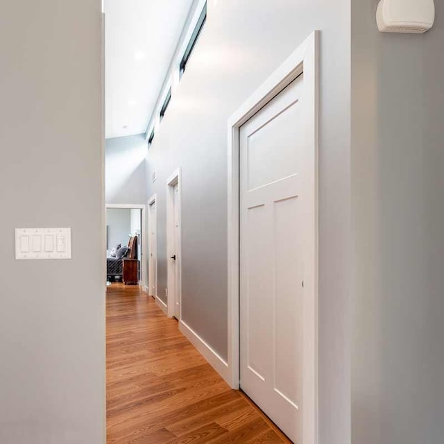 10485 Hadley Rd, Gregory, MI 48137 - corridor with light wood-type flooring and baseboards