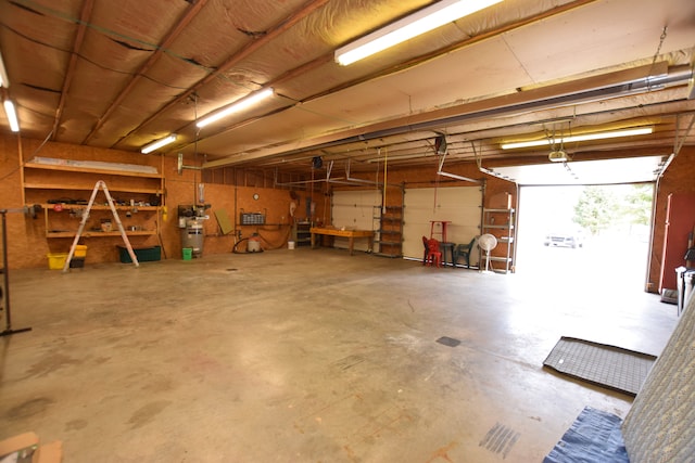 garage with a workshop area
