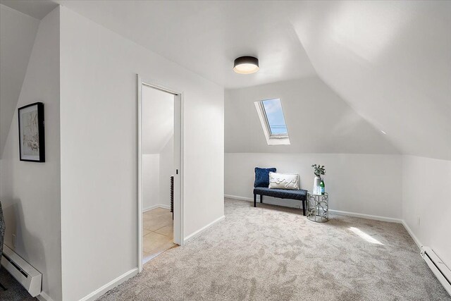 18645 Cherrylawn St, Detroit, MI 48221 - additional living space featuring baseboard heating, carpet flooring, and lofted ceiling with skylight