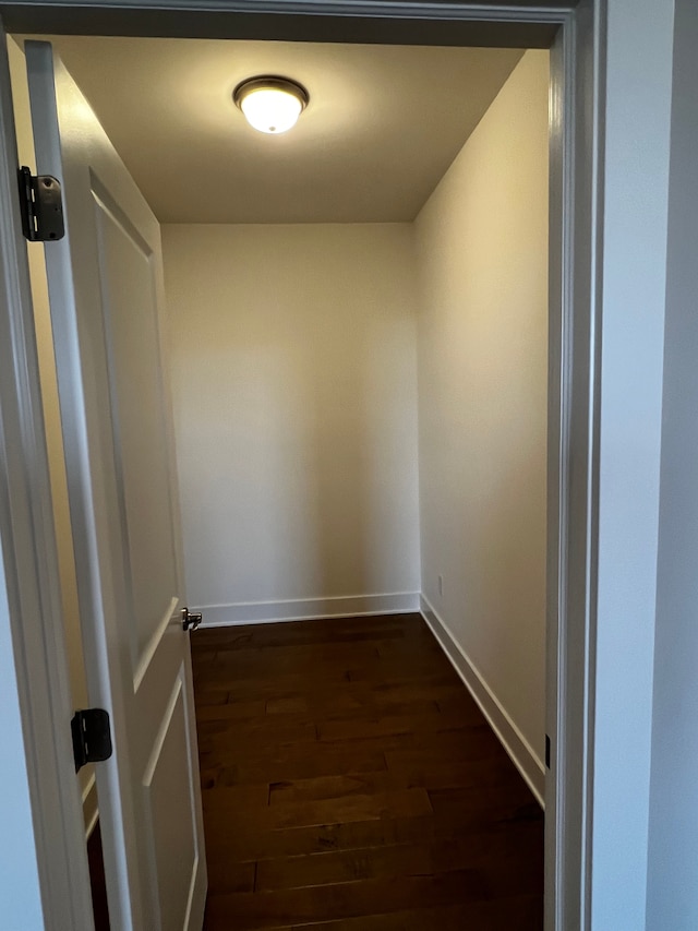 60671 Town Square St, New Hudson, MI 48165 - interior space featuring baseboards and dark wood finished floors