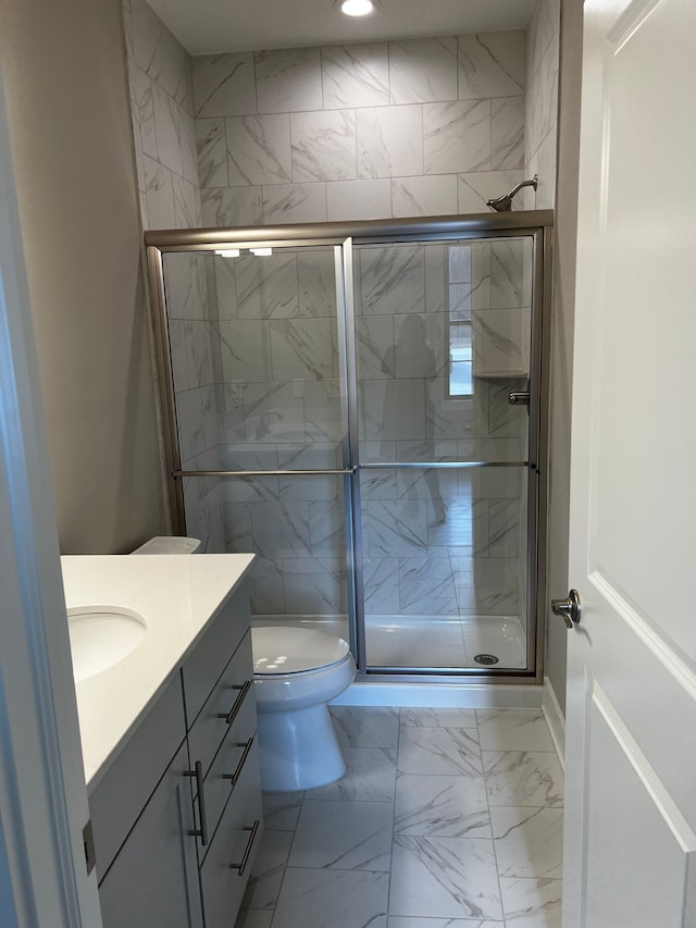 60671 Town Square St, New Hudson, MI 48165 - bathroom featuring marble finish floor, a stall shower, and vanity